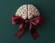 © Sabineyro - human brain with ribbon and bow as a gift