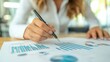 © Wanilla Artworks - Professional Analysis of Investment Management Tools with Graphs and Charts for Financial Assessment in a Modern Office Environment