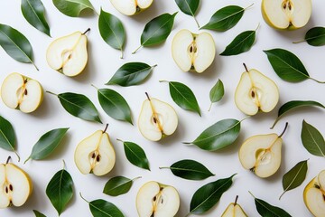 Wall Mural - Elegant arrangement of pear halves and slices surrounded by fresh green leaves on a white background