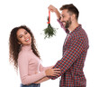 © New Africa - Lovely couple under mistletoe bunch on white background