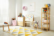 © New Africa - Beautiful child's room interior with toys and stylish furniture