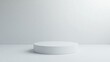 © chesleatsz - White Cylindrical Display Platform Against A White Wall