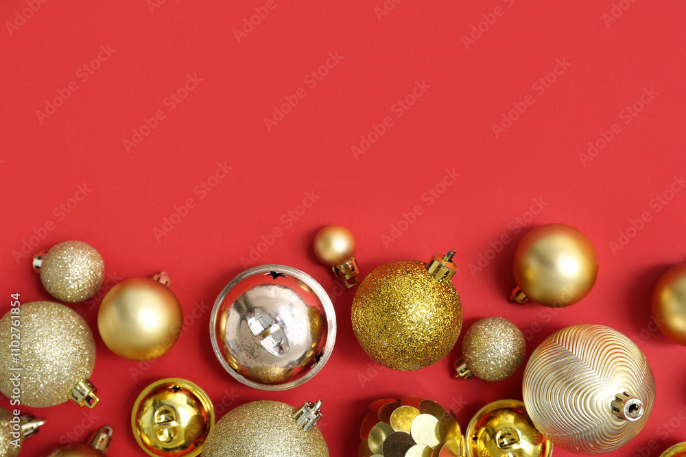 Golden Christmas balls on red background