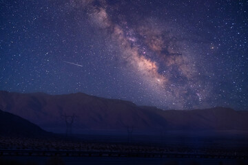 Wall Mural - Milky way over rock mountain, Utah.