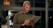 © peopleimages.com - Office, night and black woman with tablet for research, connection and scroll for startup information. Working late, business person and web designer with digital for software, design page and review