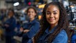 © BOJOShop - Confident Young Black Female Engineer in Factory Setting