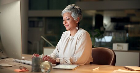 Poster - Typing, computer and mature businesswoman in office at night with email for global client report. Technology, career and female financial executive with online investment revenue in workplace.