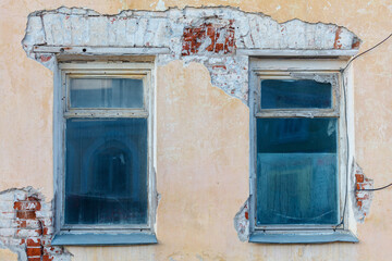 Wall Mural - The two windows are dirty and have a lot of cracks in them