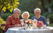© Cozy Coffee Bar - Elderly friends enjoying a meal together outdoors