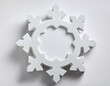 © saratm - Empty white podium in shape of a snowflake on white background