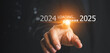 © ภาคภูมิ ปัจจังคะตา - Trends 2025 year concept. trends in 2025 with a loading bar, Trends of SEO 2025, trend for marketing monitor, business planning in new year. Analytical businessman planning business growth 2025