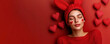 © Natalia Klenova - Beautiful Woman with Heart Face Paint and Red Bunny Ears Banner