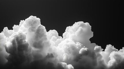 Wall Mural - white fluffy clouds billowing in a dark sky creating a dramatic atmospheric effect during twilight h