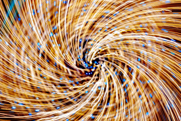 Wall Mural - Abstract swirl light trails on the dark background