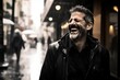 © Inigo - Handsome middle aged man with beard and mustache in a black leather jacket on a city street in the rain