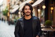 © Inigo - Portrait of a handsome young man in a leather jacket on the street