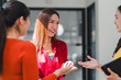 © kenchiro168 - Engaging women in conversation, sharing ideas, and building connections in modern office setting. Their expressions reflect enthusiasm and collaboration