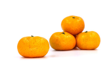 Poster - Close up of fresh orange fruit on gray background, selective focus and blank space concept.