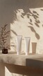 © sch_ai - A mockup of two blank white skincare tubes with a minimalist aesthetic and sunlight coming in from the right, placed on an elegant shelf against a textured wall