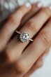 © c80 - A stunning engagement ring is showcased with a large central diamond surrounded by a halo of smaller diamonds, representing luxury, commitment, and elegance.