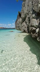 Wall Mural - beautiful view of tropical philippines island. white sand beach and bay with turquoise water, vertic