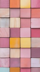 Poster - Colorful arrangement of square wooden blocks on a wall in pastel shades