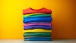 © Meffl - A stack of colorful shirts on a table