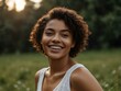 © claudunia - Beautiful woman smiling happily in nature.