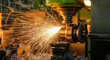 © TAMER YILMAZ - Internal grinding of a cylindrical part with an abrasive wheel on a machine, sparks fly in different directions. Metal machining.