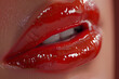 © EliteStock - Close-up of glossy red lips with an expressive shine, showcasing a seductive and glamorous aesthetic.