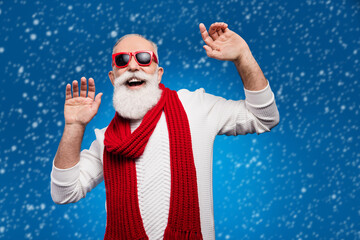 Wall Mural - Photo of charming funny mature man dressed white pullover red glasses dancing smiling isolated blue color background