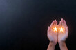 © Narongsak - Hands gently hold glowing stars, symbolizing hope, dreams, and potential. This image captures the magic of possibilities and the beauty of aspirations in a serene dark background.