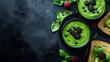 © INT888 - vibrant breakfast scene with avocado smoothie bowls topped with blackberries and blueberries, accompanied by toast and fresh basil leaves on dark textured background