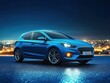 © Mandeep - sleek blue hatchback car parked at night with city lights in the background