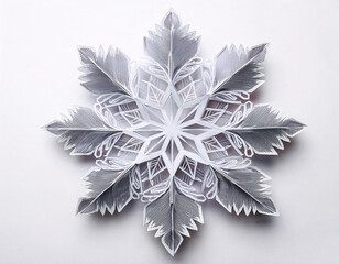 Wall Mural - An ornate silver and gold snowflake ornament with intricate details