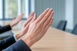 © Sanchai - A corporate setting where certificates are displayed prominently during an award ceremony, with attendees clapping