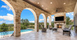 © Allison - Elegant outdoor patio with pool view in a sunny location