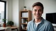 © VistaVisions - Smiling cheerful young adult caucasian american man in casual attire looking at camera standing at home office background. Happy confident white guy headshot face front close up portrait