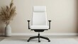 © Adul khotchasri - A stylish white office chair is placed in a minimalistic room, featuring a neutral backdrop and a decorative vase with dried foliage.