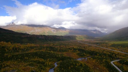Wall Mural - aerial view of scenic autumn landscape with colorful fall foliage in alaska.