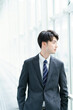 © TAGSTOCK2 - クールな表情の若手のビジネスパーソン