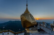 © sippakorn - The sun set in twilight evening at   Kyaiktiyo pagoda, Golden rock, Myanmar.