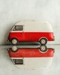 © Feri - Red and White Vintage Toy Van Reflecting in a Polished Surface: A Still Life Photography