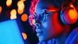 © NovaVision - Focused African American Woman Gaming with Neon Glow