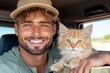 © Nata - A smiling man with a cat in the back seat of a car. Generative AI