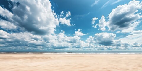 Poster - Vast empty sand beach under a stunning cloudy sky creates a tranquil scene. This serene landscape of the sand beach offers beautiful scenery and ample copy space for various uses.