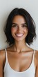 © BrandwayArt - Smiling woman with short dark hair on neutral backdrop