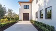 © Nadeem Art - Modern house with white stucco walls, charcoal windows, and a wooden mahogany door.