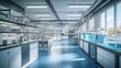 © Panuwat - Modern laboratory high ceiling blue flooring is filled a clean lab