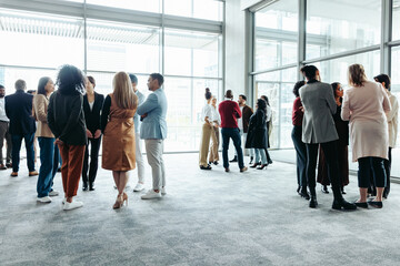 Wall Mural - people networking at a business conference event